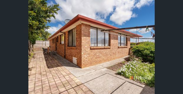 Low maintenance home - Photo 1