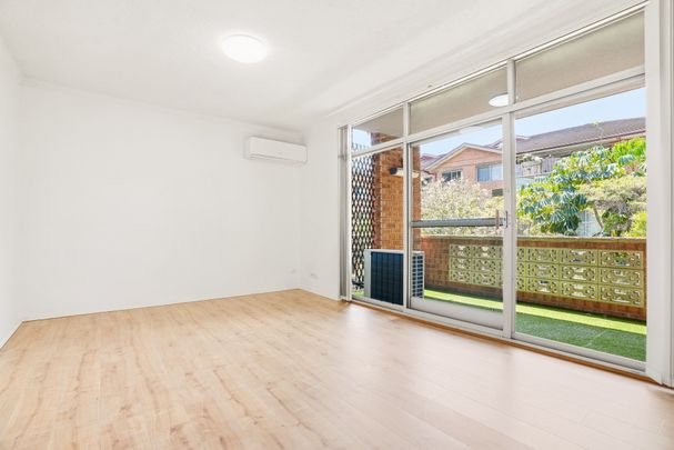 Air-Conditioned Two-Bedroom Unit with Laminate Timber Flooring, Single Car Space and Swimming Pool in the Complex! - Photo 1