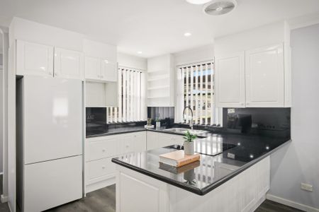 RENOVATED THREE BEDROOM HOME - Photo 4