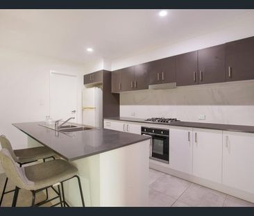 Spacious Four-Bedroom Duplex with Everything You Need - Photo 4