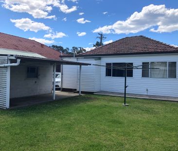 Charming 3-Bedroom Home in a Prime Location - Photo 1