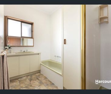 Quality Three-Bedroom Living with Multiple Living Areas and Secure ... - Photo 3