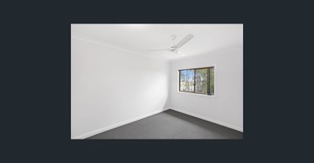 Spacious Two-Bedroom Townhouse in Convenient Location - Photo 2