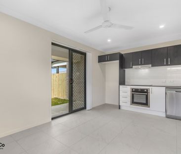 STYLISH & MODERN 2BED HOME WITH LARGE FULLY FENCED BACKYARD - Photo 5