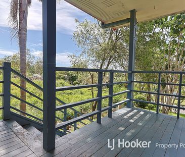 Family-Friendly Comfort with Large Backyard & Renovated Interiors - Photo 4