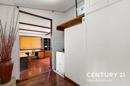 Charming 1950s Home with Modern Flexibility & Pristine Gardens! - Photo 2