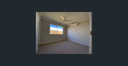 Three Bedroom Duplex in Logan Reserve - Photo 4