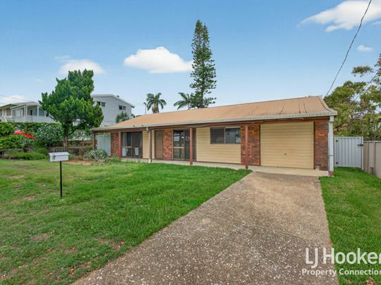 Low Set Brick Home Offering Comfort, Convenience and Charm - Photo 1