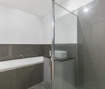 Spacious Family Haven with Multiple Living Zones - Photo 4