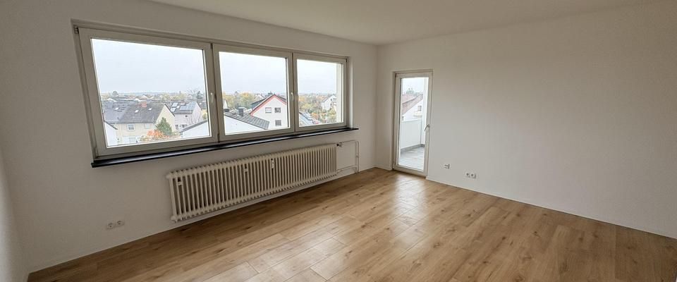 Moderne und lichtdurchflutete 3 Zimmerwohnung mit weitem Ausblick auf Rodgau und den Taunus - Foto 1