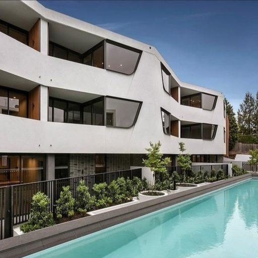 Modern Urban Living with Poolside Views! - Photo 1