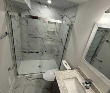 68 St. Joan Of Arc Avenue #BSMT - Photo 6