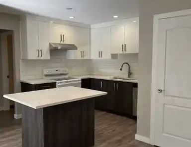 Spacious, Modern 2 Bedroom Apartment in desirable Crescent Height | 1423 1 Street Northeast, Calgary - Photo 1