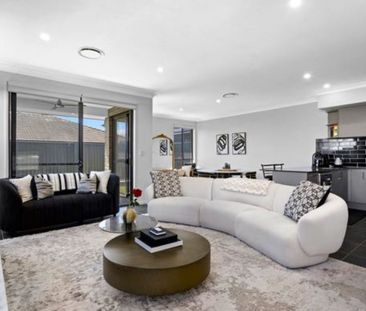 Effortless Modern Living in a Family-Friendly Location! - Photo 1