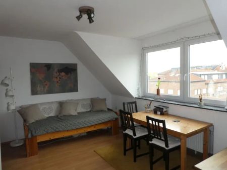 Hübsche 2-Zimmer-Dachgeschoss-Wohnung im Herzen von Asberg - Photo 3