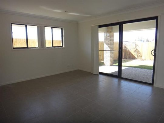 Great Family Home in Sought-After Coomera Grand Estate - Photo 1