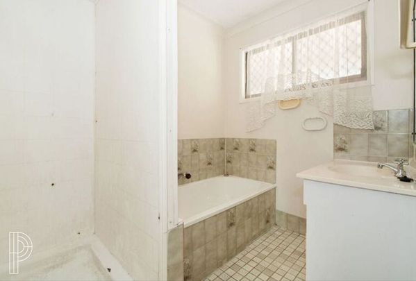 Spacious Family Home in Convenient Location - Photo 1