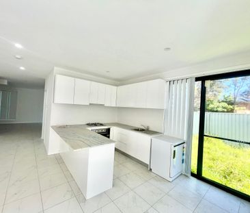 Spacious 5-Bedroom Home - Perfect for Families - Photo 4