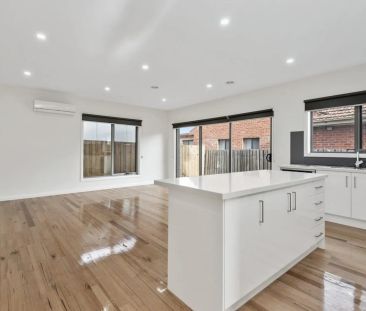 Move-In Ready: Modern 3-Bedroom Townhouse with Park Views - Photo 2