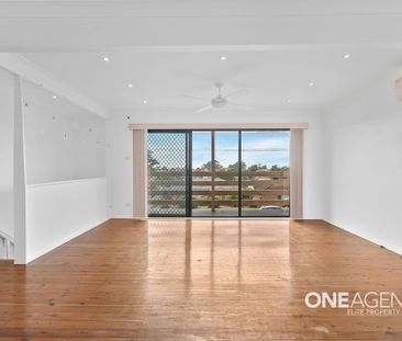 COMFORTABLE FAMILY LIVING IN THE HEART OF BARRACK HEIGHTS - Photo 1