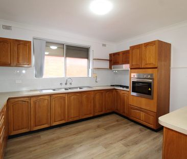 RENOVATED THREE BEDROOM BRICK HOME - Photo 6