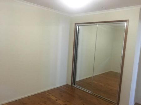 Charming 3-Bedroom Home with a Spacious Backyard! - Photo 2