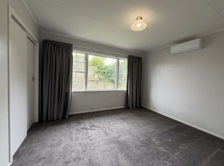 This well-presented 3-bedroom home is perfect for families - Photo 2