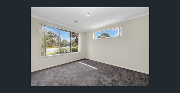 Large 4 Bedroom Home with Spacious Rear Yard - Photo 1