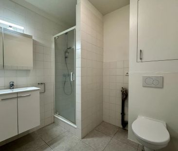 Verzorgd gelijkvloers appartement met 2 slaapkamers en garage. - Foto 4