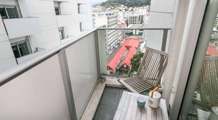 Stylish 2BR City Apt with Amenities - Photo 5