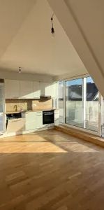 1-Zimmer-Wohnung mit großer Terrasse im DG in ländlicher Ruhelage - schöner Neubau - zu mieten in 1230 Wien - Foto 1
