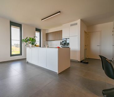 Uniek bijna energieneutraal hoekappartement met ruim terras - Photo 6