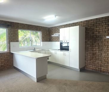 NEWLY RNEOVATED 2 BEDROOM UNIT WITH LOCK-UP GARAGE - Photo 1