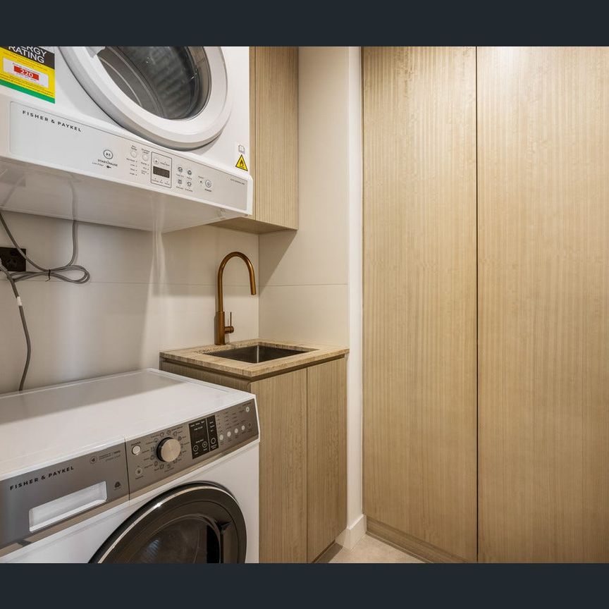 Furnished Coastal Prestige | Luxury Residence - Photo 1