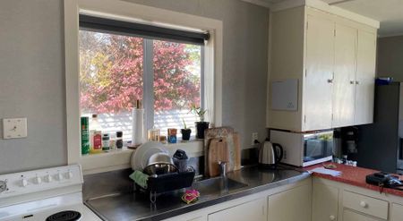 Charming Three-Bedroom Home Close to Town! - Photo 2