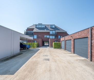 Ruim gelijkvloers appartement met tuin en carport! - Foto 2