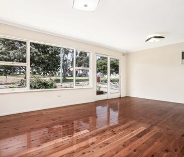 Five-Bedroom Multi-Level Family Home with Expansive Lawn - Photo 6