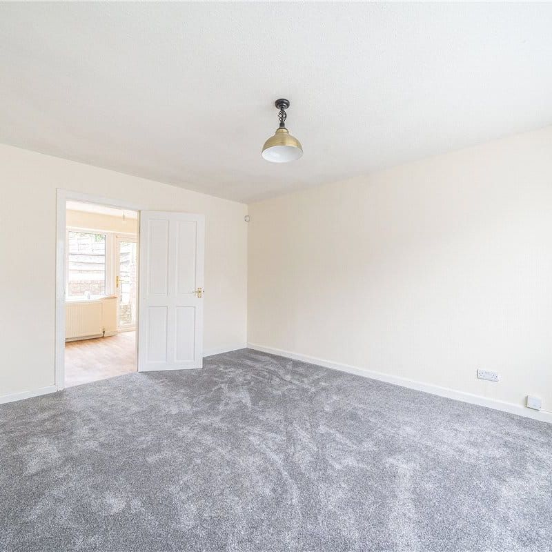 A three bedroom semi-detached family home with a garage and off-street parking in Bredbury. - Photo 1