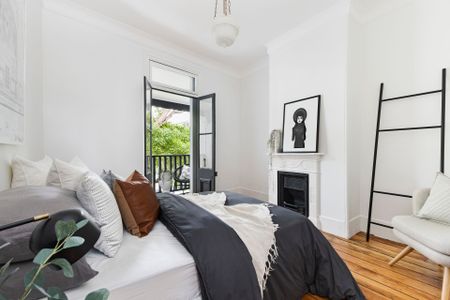 Classic terrace charm in a vibrant village setting - Photo 4