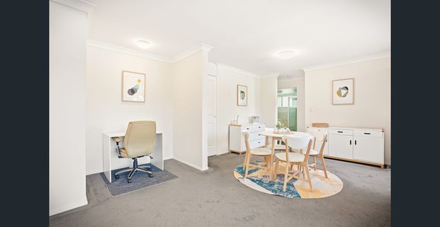 Spacious double brick apartment offering style, comfort, and easycare living - Photo 1