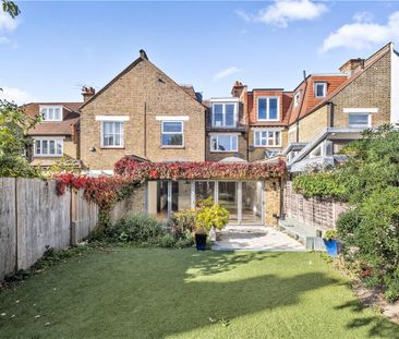 Excellent large newly refurbished five-bedroom family home with lots of light and entertaining space, and stunning large kitchen/family room leading to a good sized lawned South facing garden and off street parking for two cars. - Photo 3