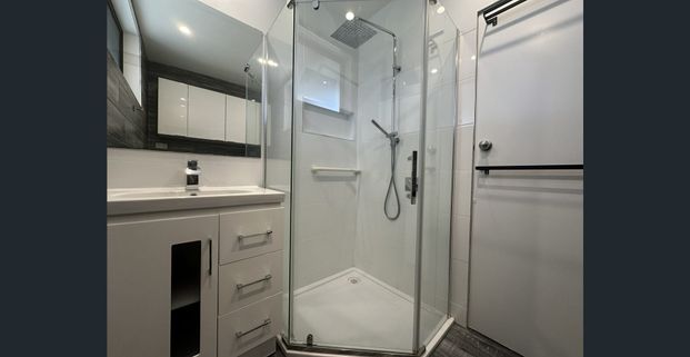 UPDATED UNIT BY THE BEACH - Photo 1