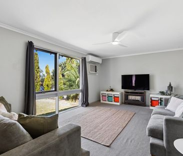 Neat Three-Bedroom Family Home in Convenient Location - Photo 2