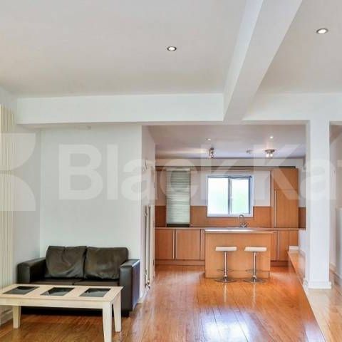 Semi split level, mezzanine area and gorgeous balcony - Photo 1