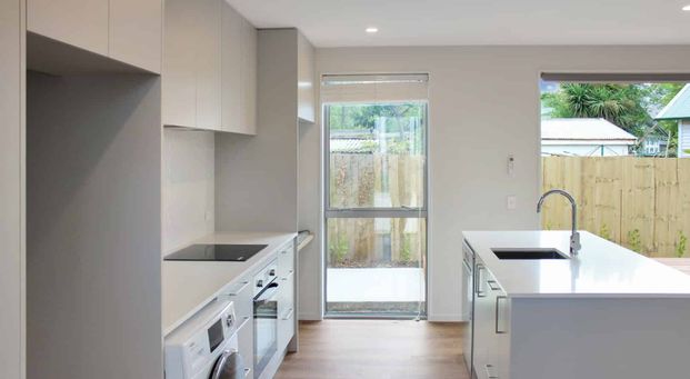 Near New Two Level Townhouse With Parking - Photo 1