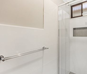 Charming & Easy-Care Brick Home with Inviting Outdoor Spaces - Photo 1