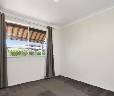 Charming 3 Bedroom Home with Spacious Backyard & double shed - Photo 6