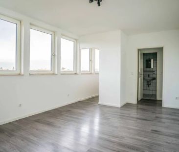 Nettes Dachgeschoss-Appartement mit Einbauküche und Aufzug in ruhig... - Foto 1