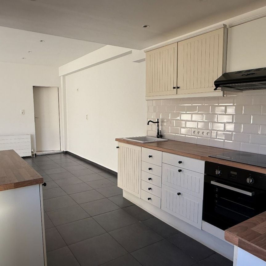 Verzorgd gelijkvloers 1-slpk appartement met tuin - Photo 1