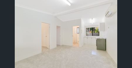 Neat & tidy 2 bed unit by the Beach - Photo 2